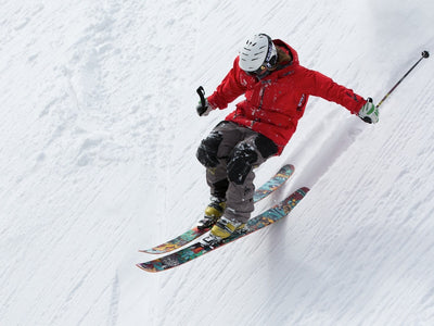 Man skiing steep hill, Best Ski Holidays